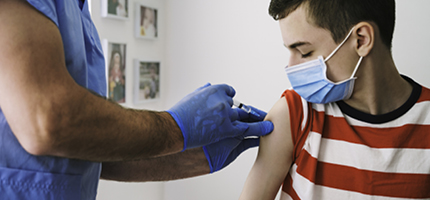 Young boy getting a vaccine